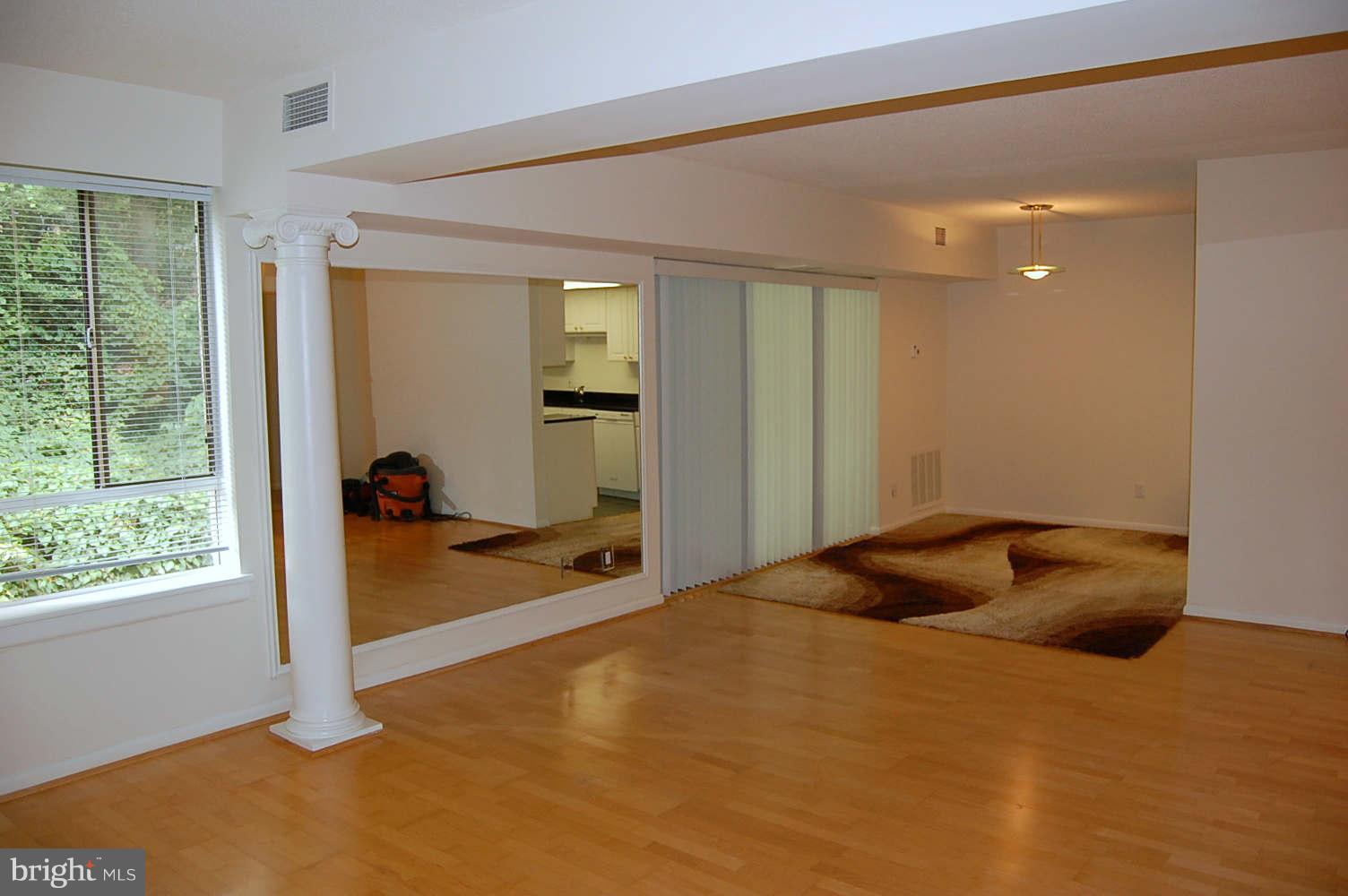 11604 Stoneview Square, Unit 11C Reston, VA 20191 - Photo 6 of 15 Living Room and Dining Room
