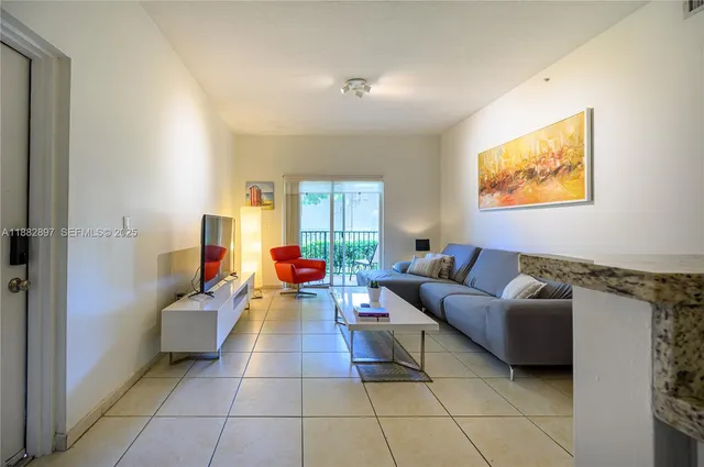 a living room with furniture and a couch