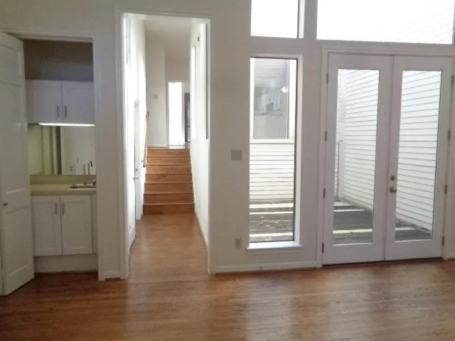 a view of livingroom with hardwood floor and window