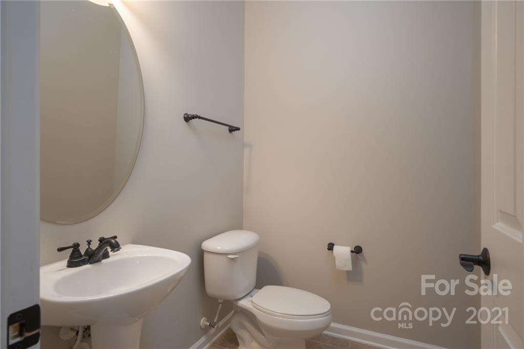 625 Sunfish Lane Tega Cay, SC 29708 - Photo 22 of 48 a bathroom with a sink toilet and a mirror