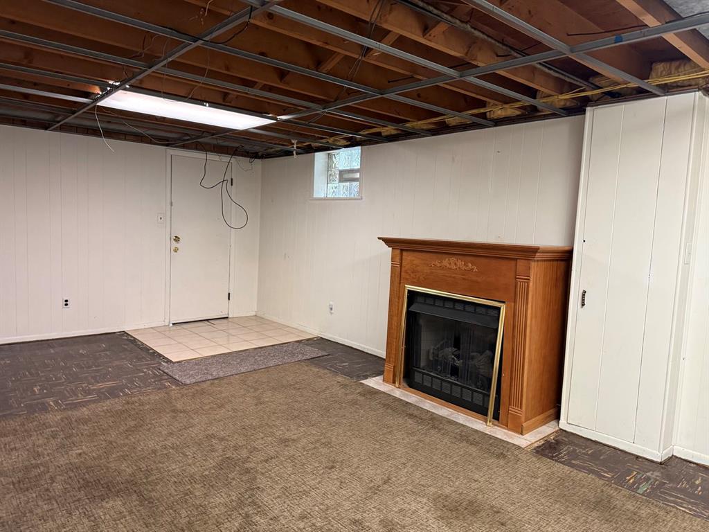 27 Corbett Avenue Irwin, PA 15642 - Photo 24 of 39 a view of an empty room with a fireplace