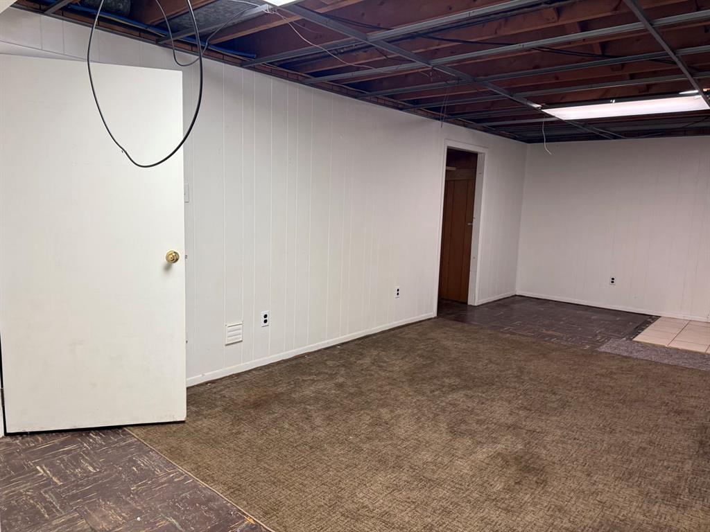 27 Corbett Avenue Irwin, PA 15642 - Photo 25 of 39 a view of a room with wooden floor and a glass door