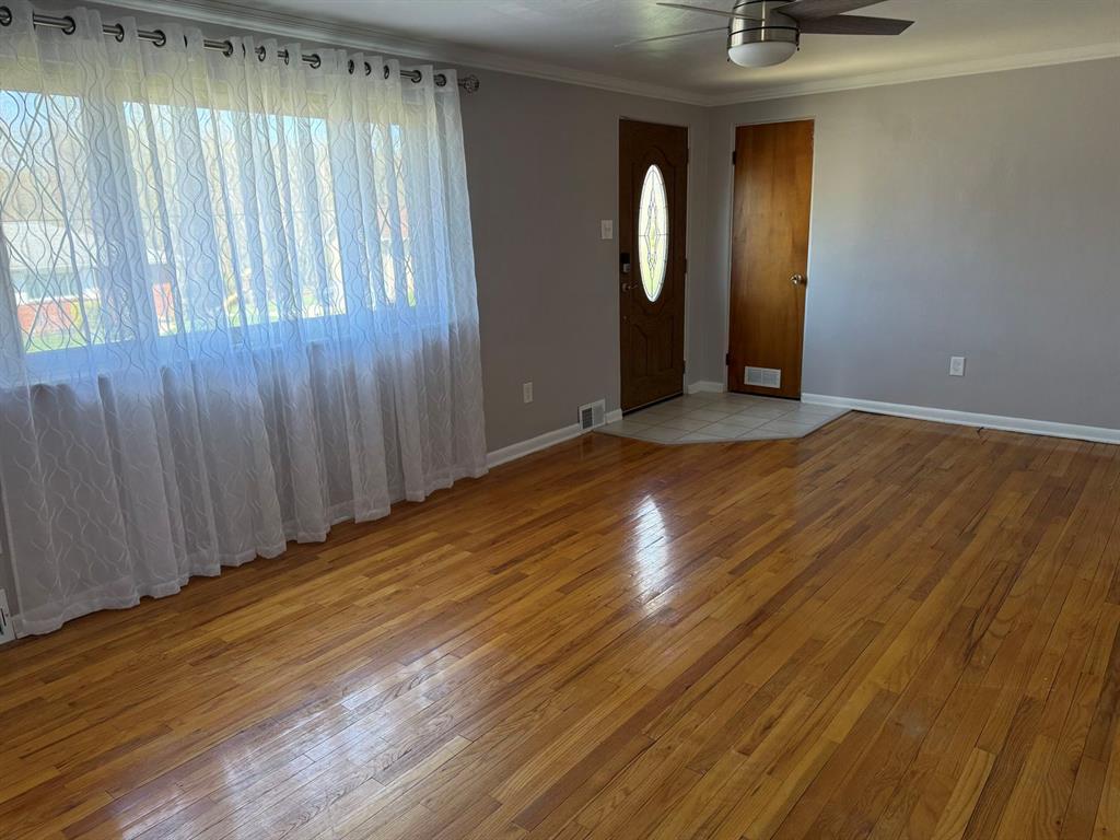 27 Corbett Avenue Irwin, PA 15642 - Photo 5 of 39 a view of entryway with wooden floor