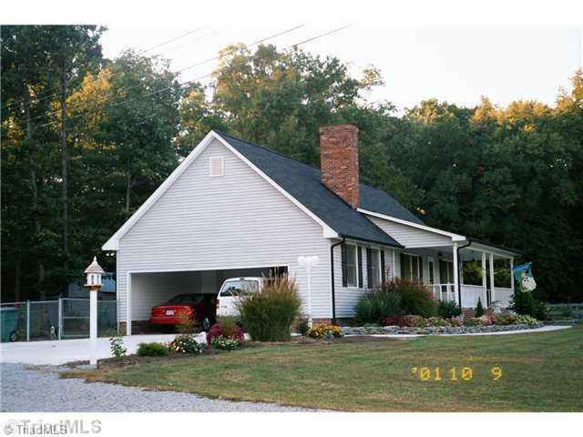 7026 Penman Road High Point, NC 27263 - Photo 2 of 16 Exterior Front. Side view shows fenced rear area for pets