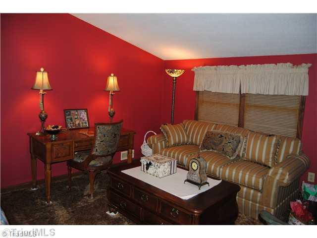 7026 Penman Road High Point, NC 27263 - Photo 12 of 16 3rd Bedroom. 3rd bedroom offers a closet and is also a loft area.