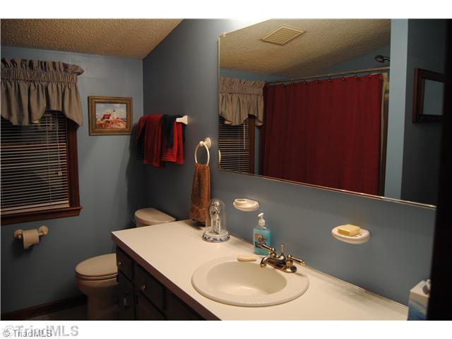 7026 Penman Road High Point, NC 27263 - Photo 13 of 16 Other Bath. Upstairs bath offers lots of updates including new tub