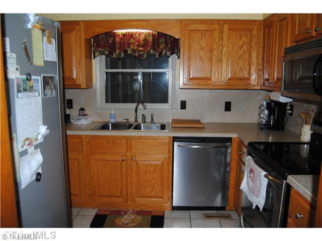 7026 Penman Road High Point, NC 27263 - Photo 6 of 16 Kitchen. Anot6her view of kitchen. Lots of cabinets and counter space