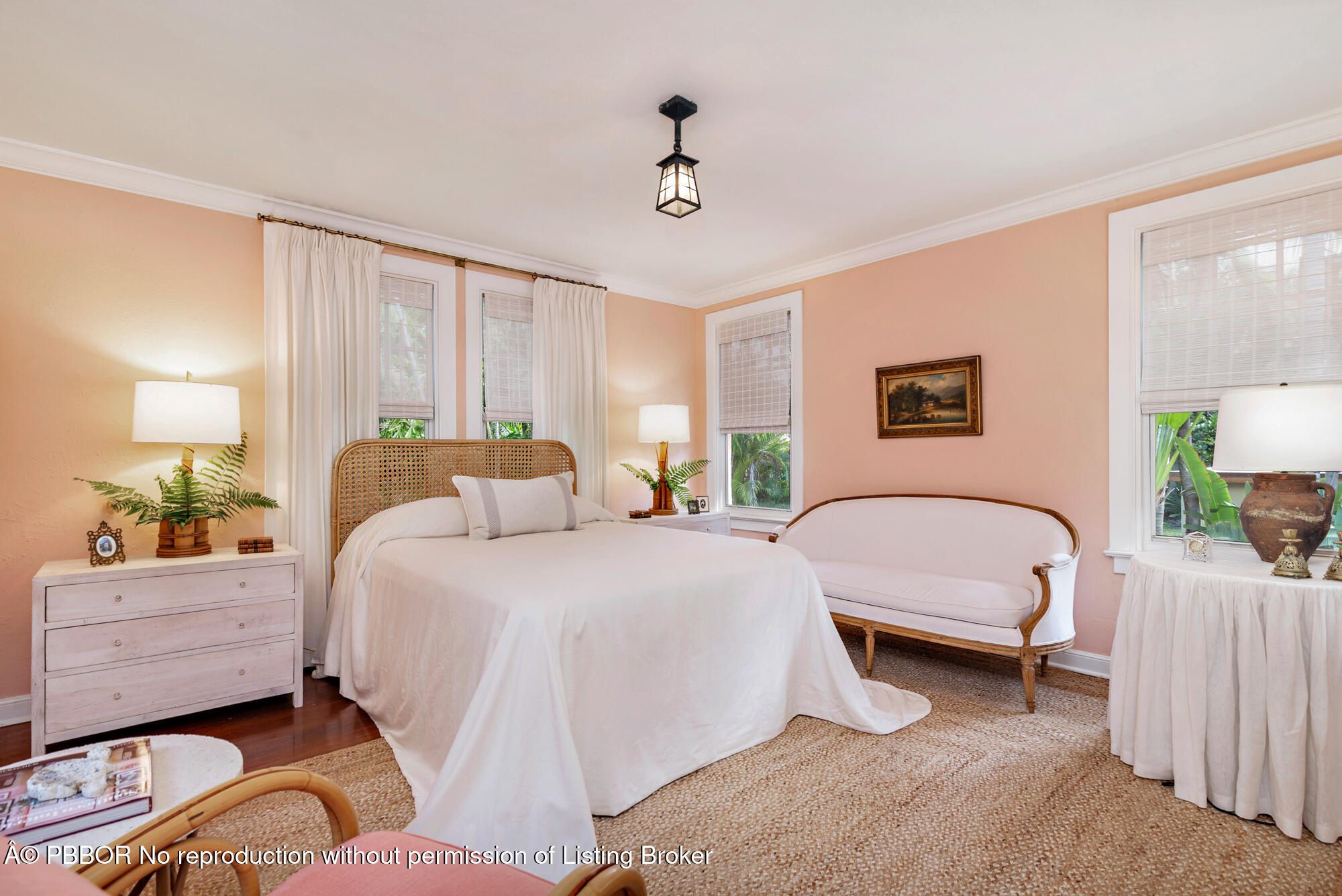 746 Upland Road West Palm Beach, FL 33401 - Photo 12 of 26 a bedroom with a bed a couch and potted plant