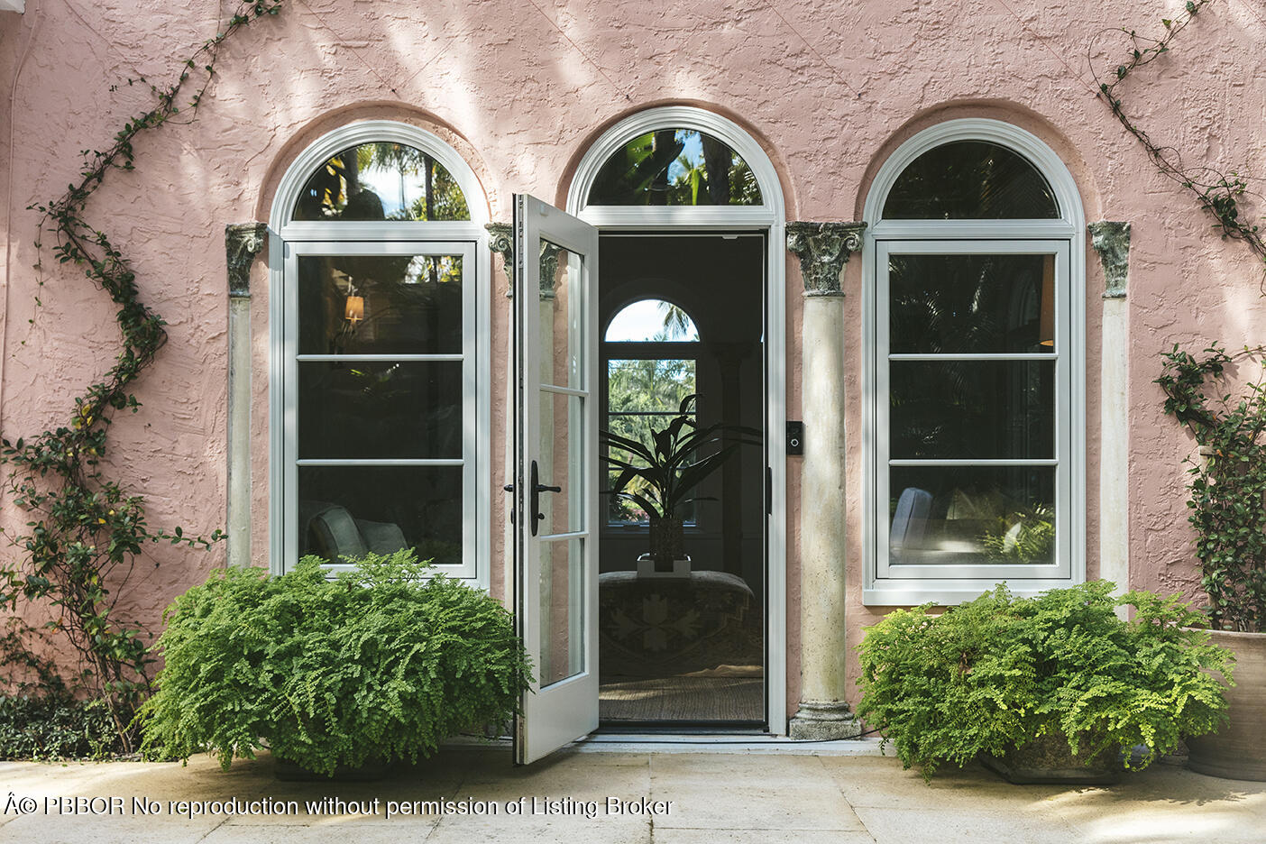 746 Upland Road West Palm Beach, FL 33401 - Photo 14 of 26 a view of front door view of yellow house