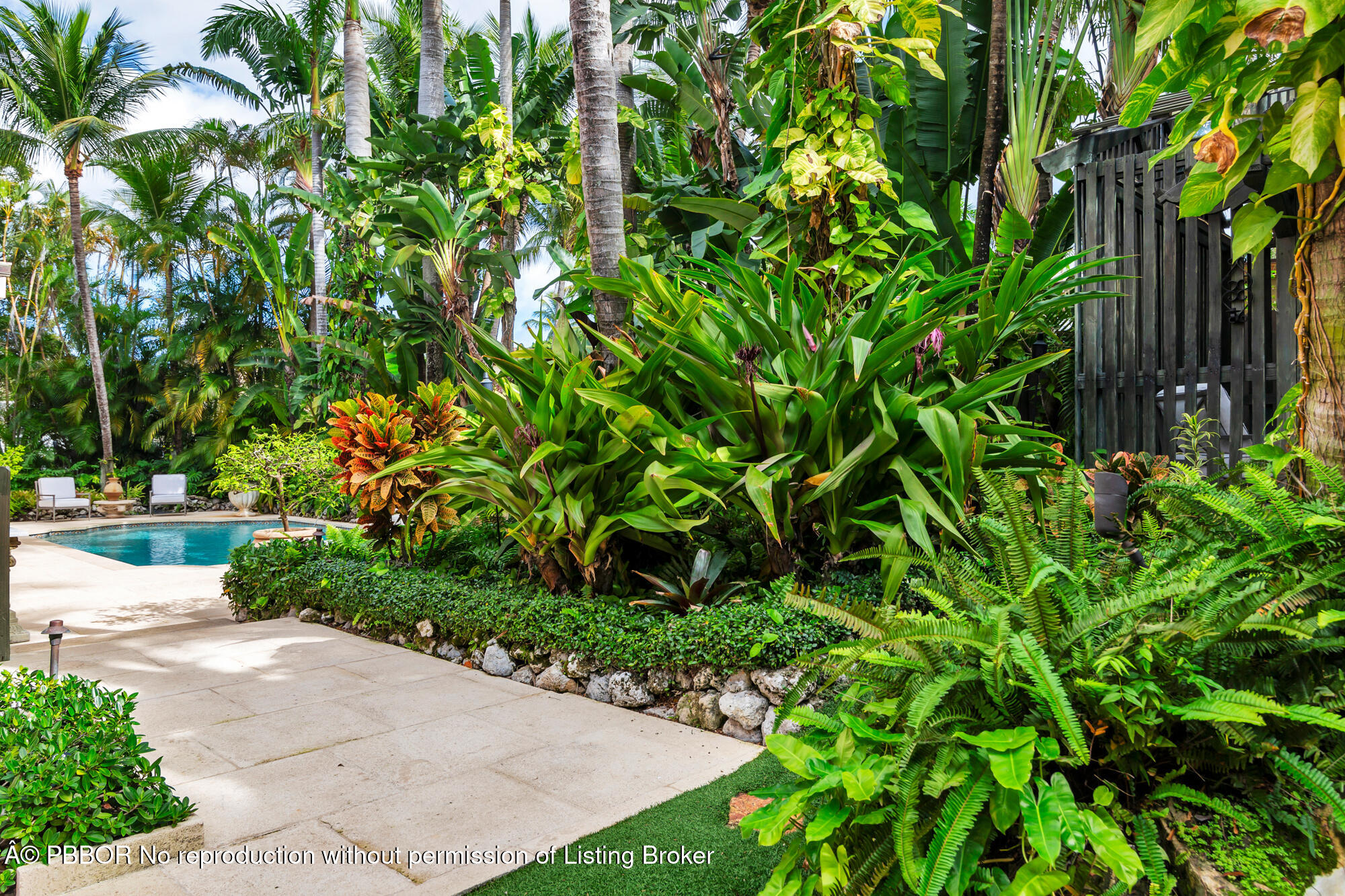 746 Upland Road West Palm Beach, FL 33401 - Photo 16 of 26 a view of a garden with plants