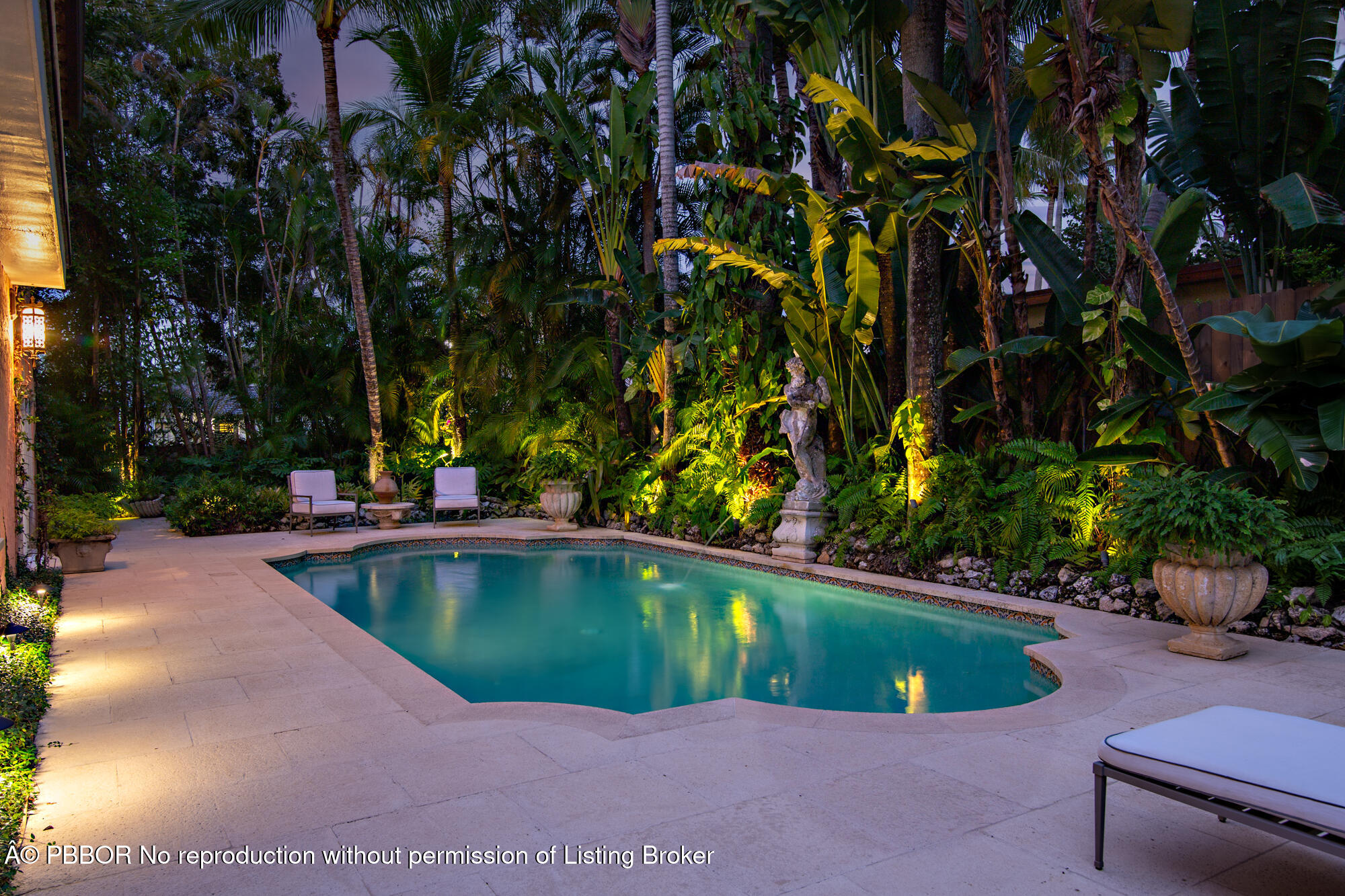 746 Upland Road West Palm Beach, FL 33401 - Photo 19 of 26 a view of a swimming pool with a patio