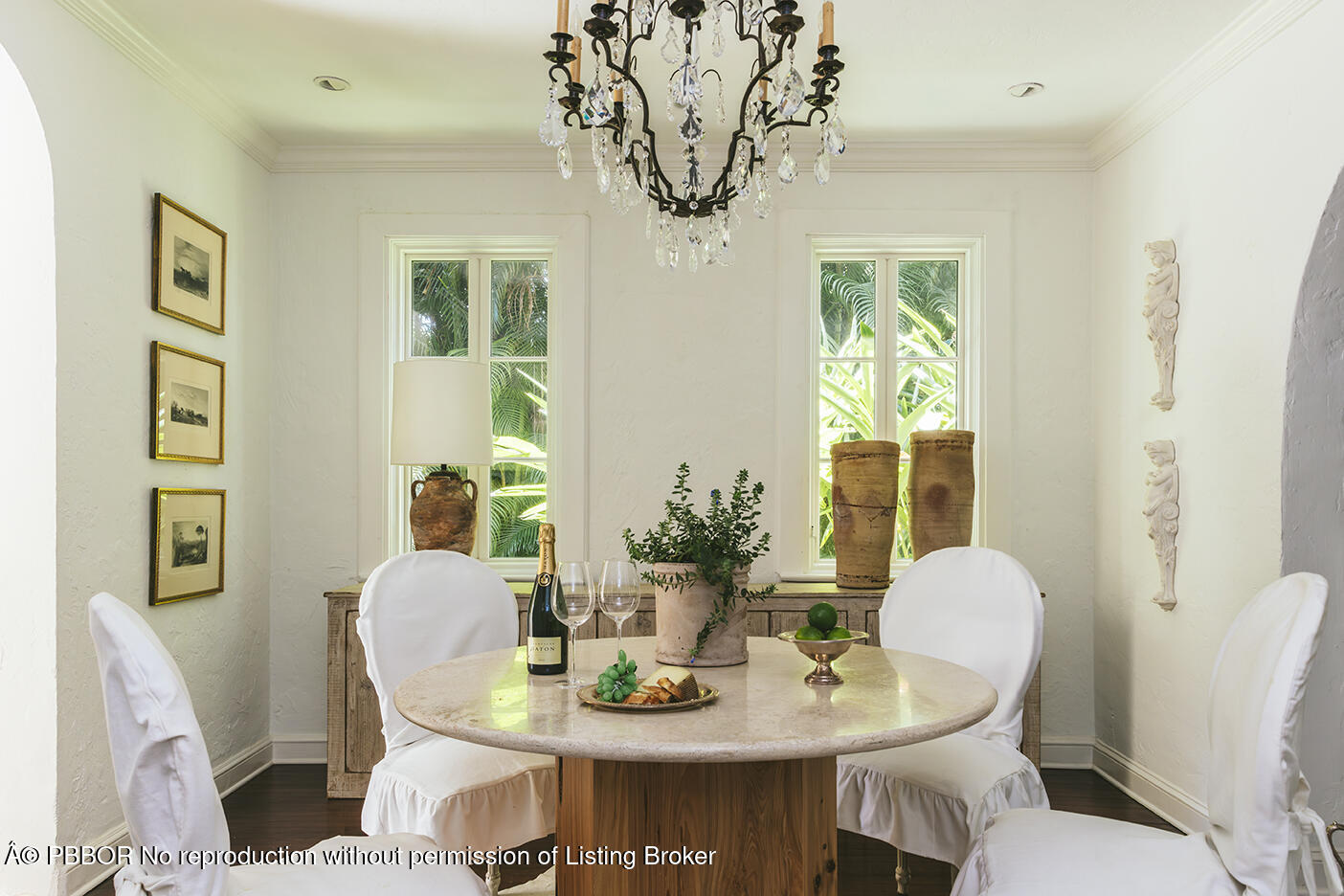 746 Upland Road West Palm Beach, FL 33401 - Photo 4 of 26 a view of a dining room with furniture window and wooden floor