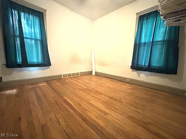 805 Rudyard Road Cleveland, OH 44110 - Photo 19 of 45 Spare room with hardwood / wood-style floors and baseboards