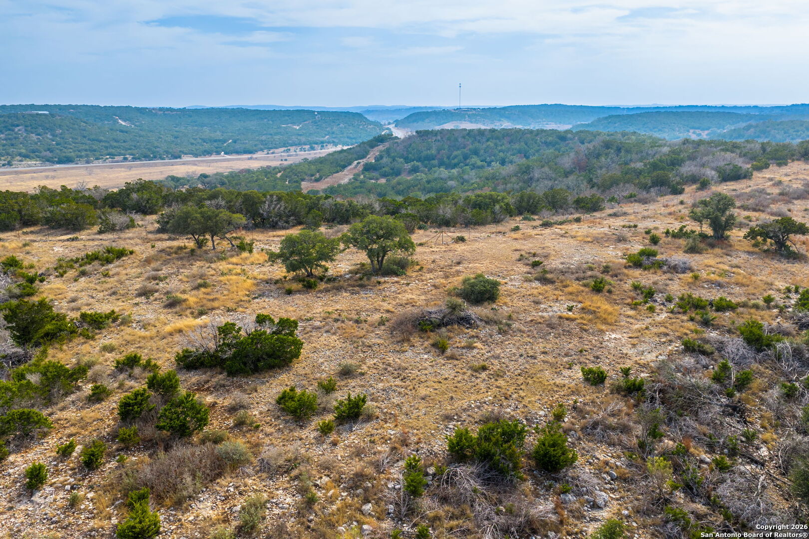 Lot 34 Great Sky Ranch Kerrville, TX 78028 - Photo 7 of 20 a view of a lake with mountains in the background