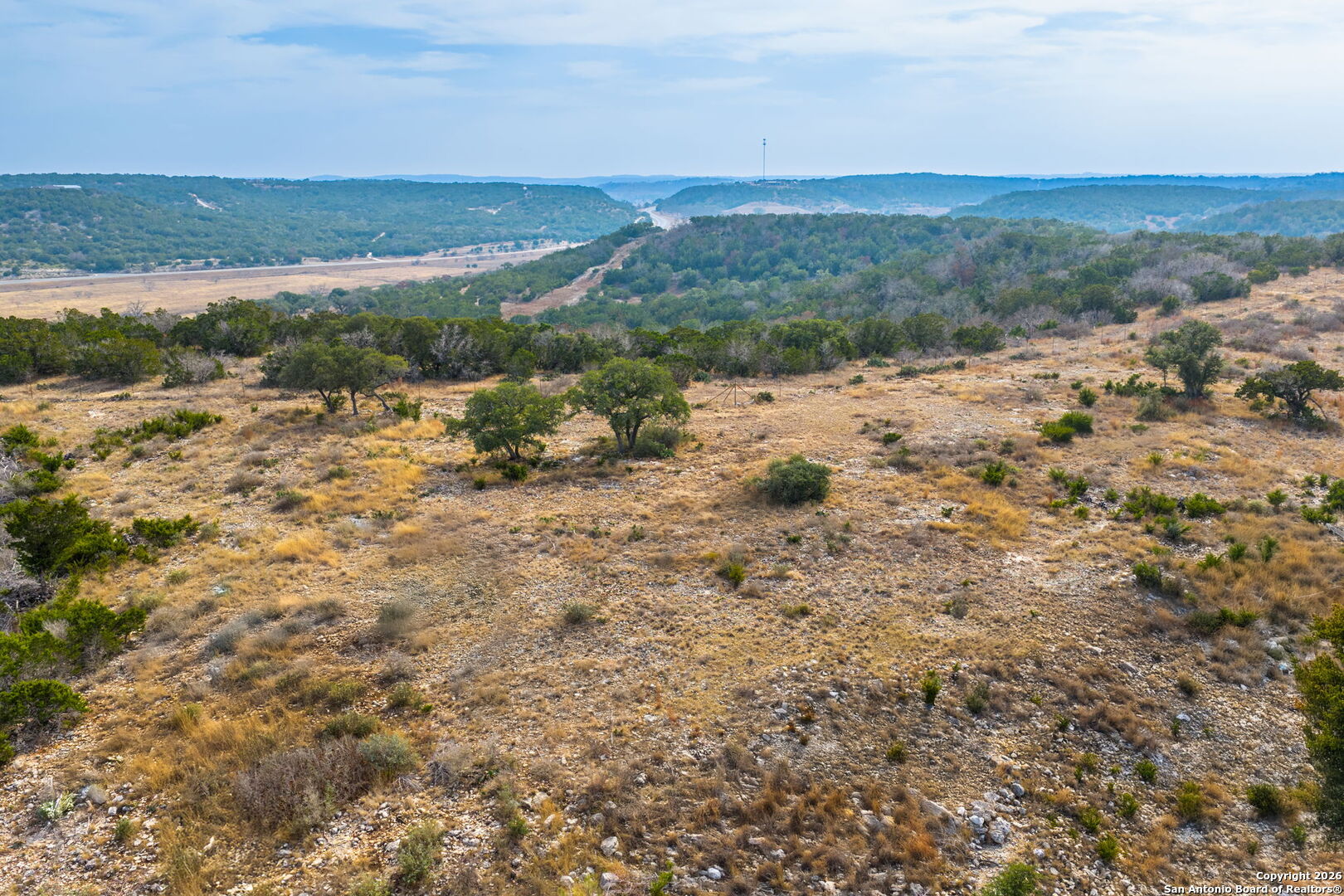 Lot 34 Great Sky Ranch Kerrville, TX 78028 - Photo 9 of 20 a view of a lake with mountains in the background