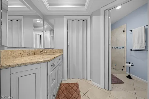 a bedroom with bed and window