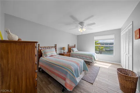 a bedroom with furniture and a rug