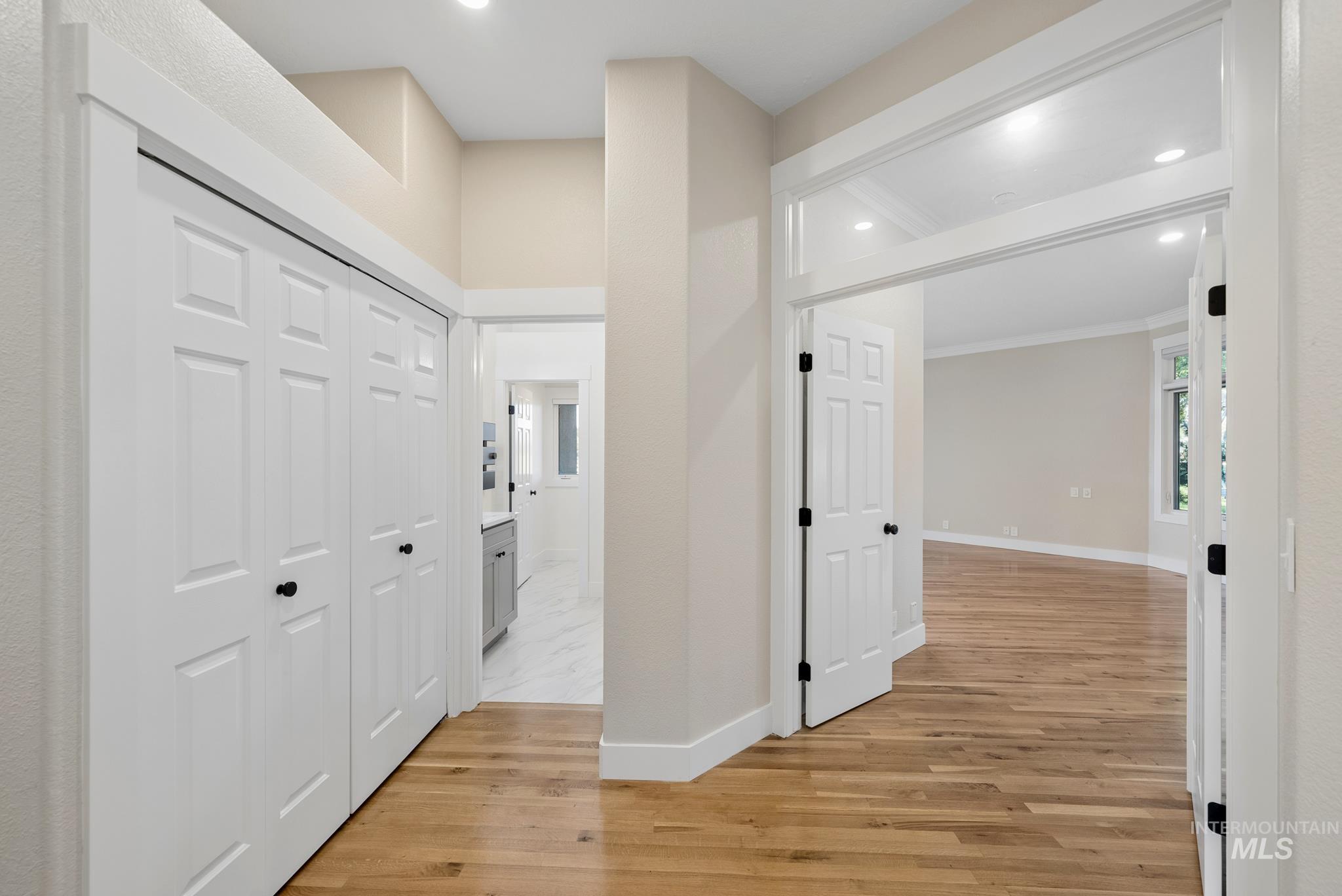2050 Artesian Road Eagle, ID 83616 - Photo 21 of 49 Entryway featuring a white door with decorative glass panels, sidelights, and a transom window