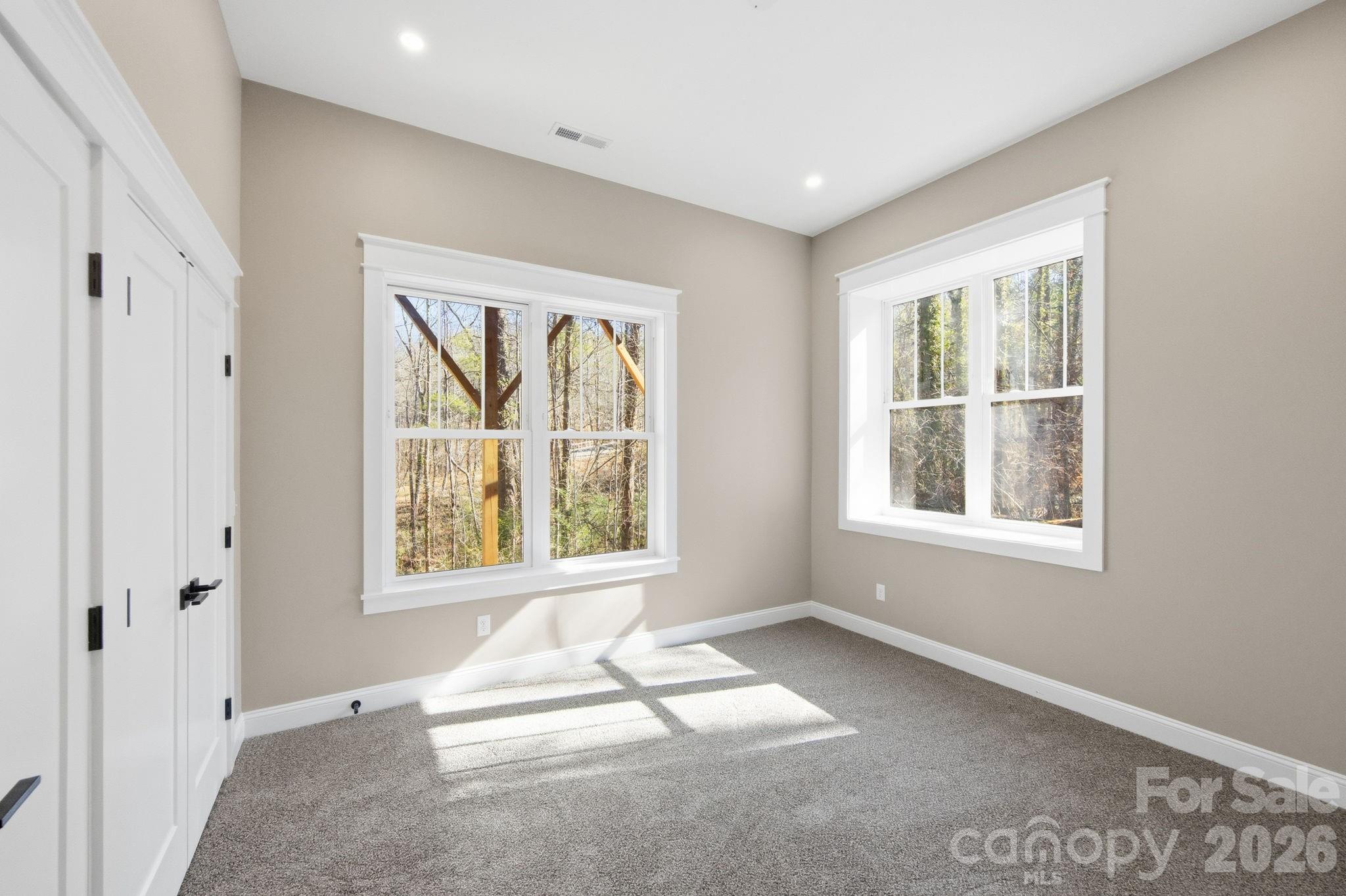 22 Deep Woods Road Weaverville, NC 28787 - Photo 25 of 37 an empty room with windows