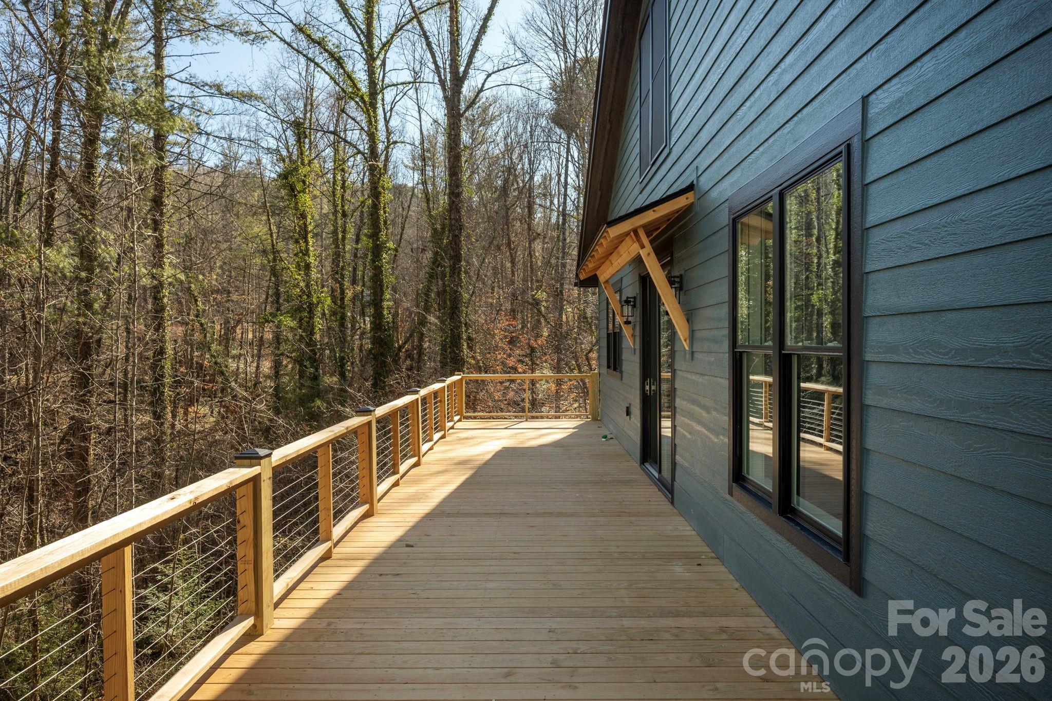 22 Deep Woods Road Weaverville, NC 28787 - Photo 31 of 37 a view of balcony with wooden floor and fence