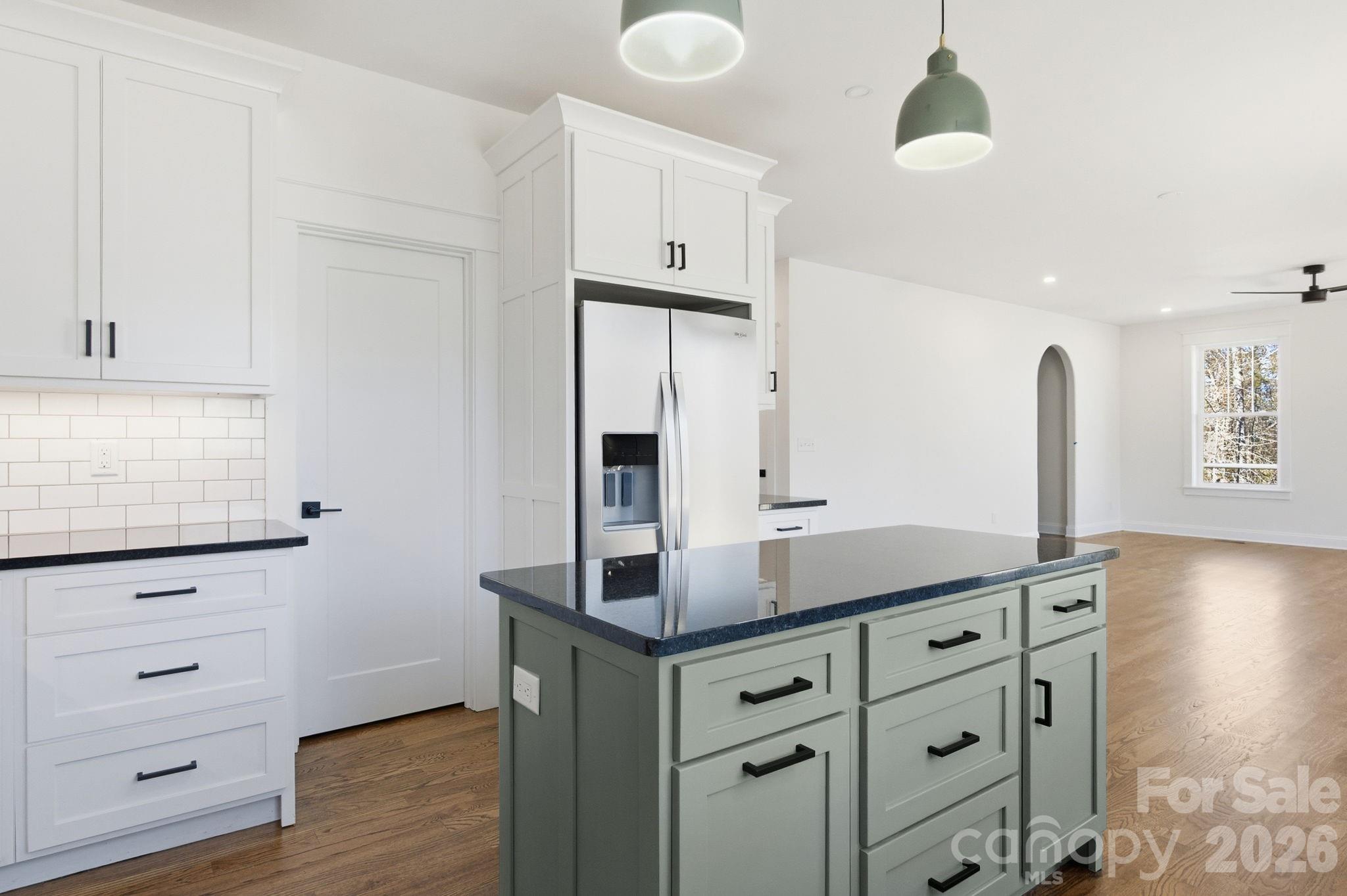 22 Deep Woods Road Weaverville, NC 28787 - Photo 9 of 37 a kitchen with cabinets appliances and a counter space