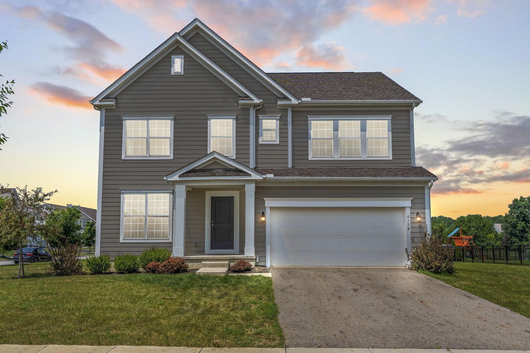 6158 Heather Ridge Drive Delaware, OH 43015 - Photo 1 of 51 front of home twilight