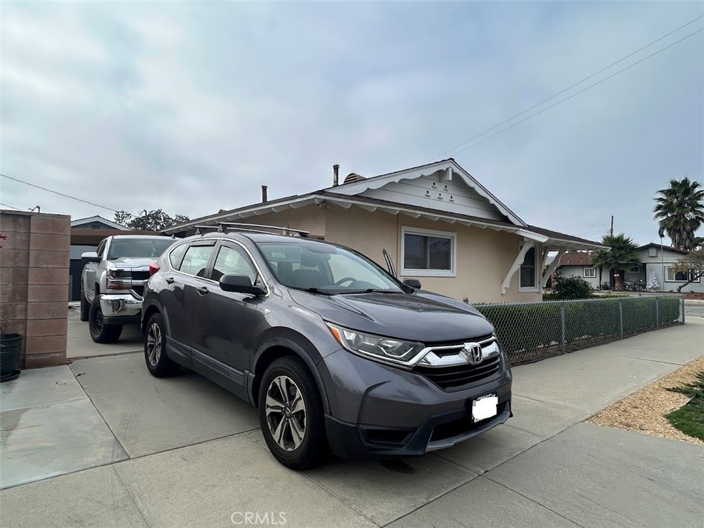 641 North Milford Road Orange, CA 92867 - Photo 25 of 25 a car parked in front of a house