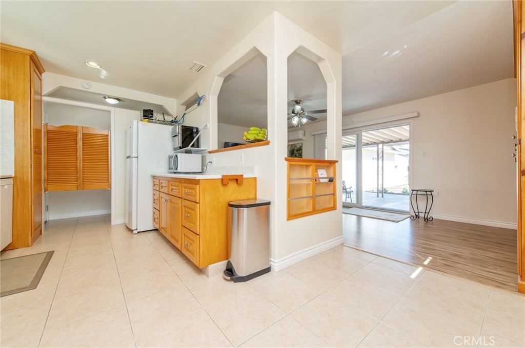 641 North Milford Road Orange, CA 92867 - Photo 6 of 25 a view of a kitchen with furniture and window