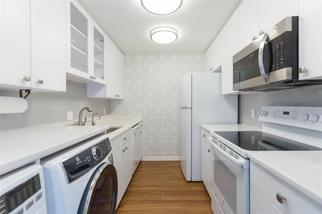 $369,000 | 3211 West Swann Avenue, Unit 1001, Tampa, FL 33609