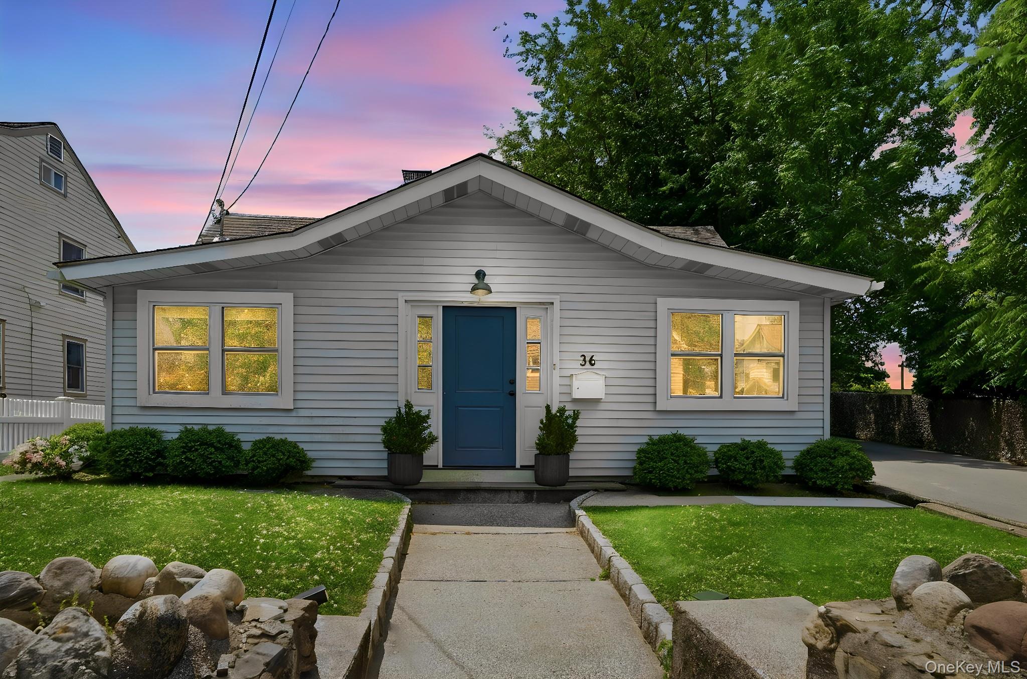 36 Dearborn Avenue Rye, NY 10580 - Photo 24 of 30 a front view of a house with garden