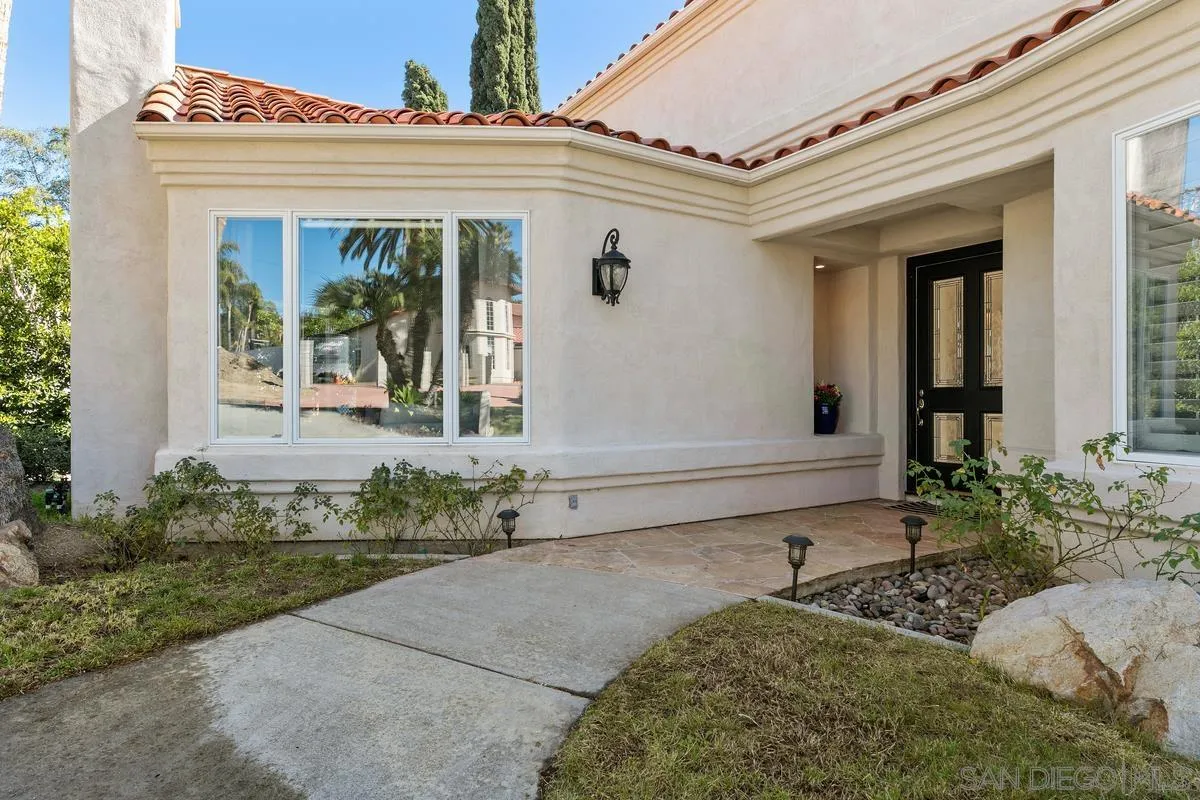255 Cole Ranch Road Encinitas, CA 92024 - Photo 3 of 45 a front view of a house with garden
