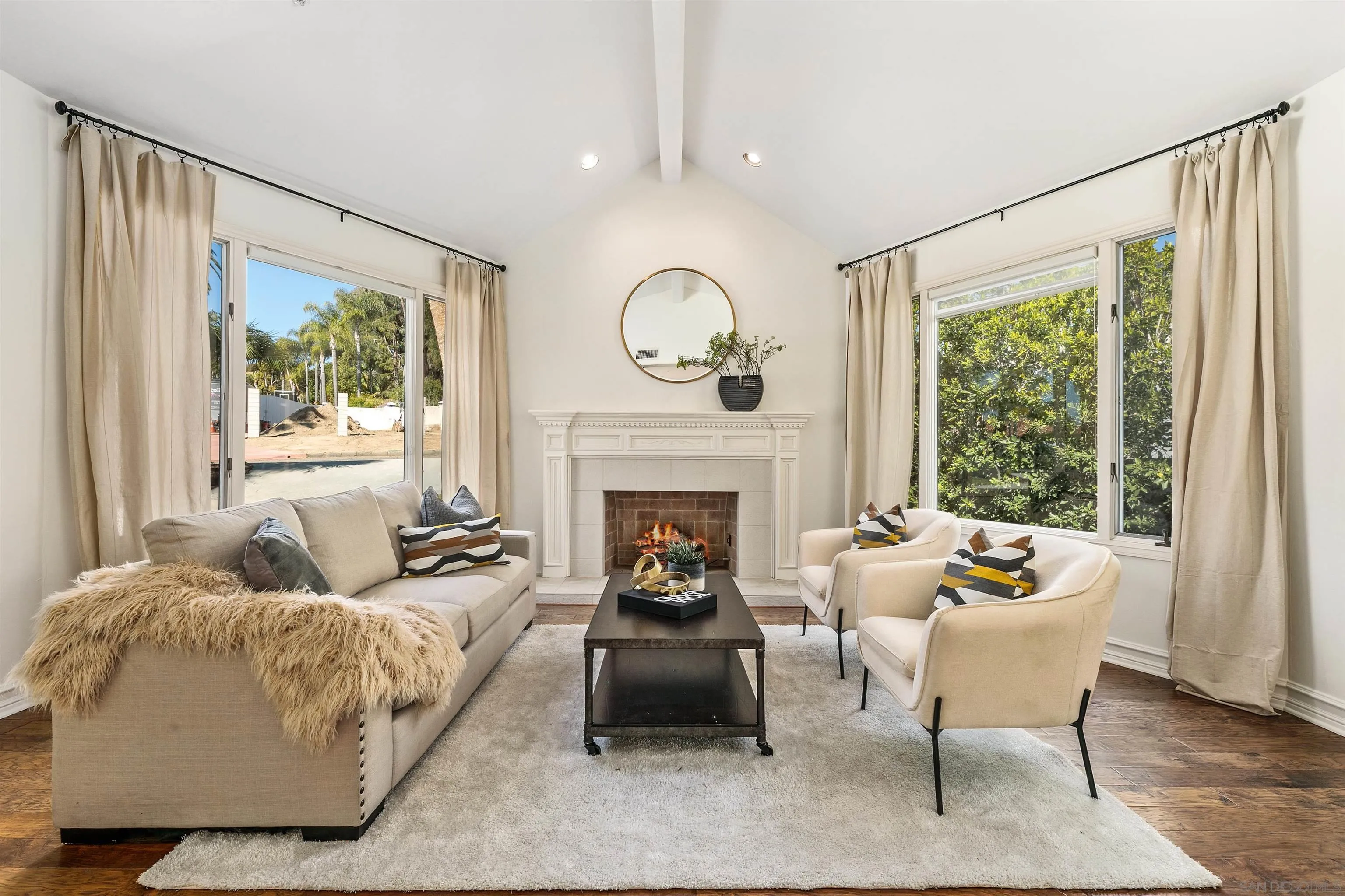 255 Cole Ranch Road Encinitas, CA 92024 - Photo 8 of 45 a living room with furniture and a fireplace