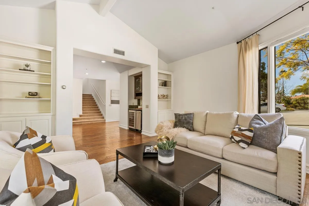 255 Cole Ranch Road Encinitas, CA 92024 - Photo 9 of 45 a living room with furniture and a large window