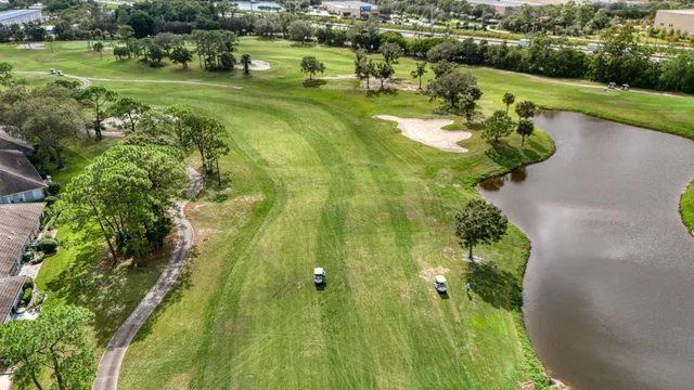 a view of a swimming pool in he middle of the house