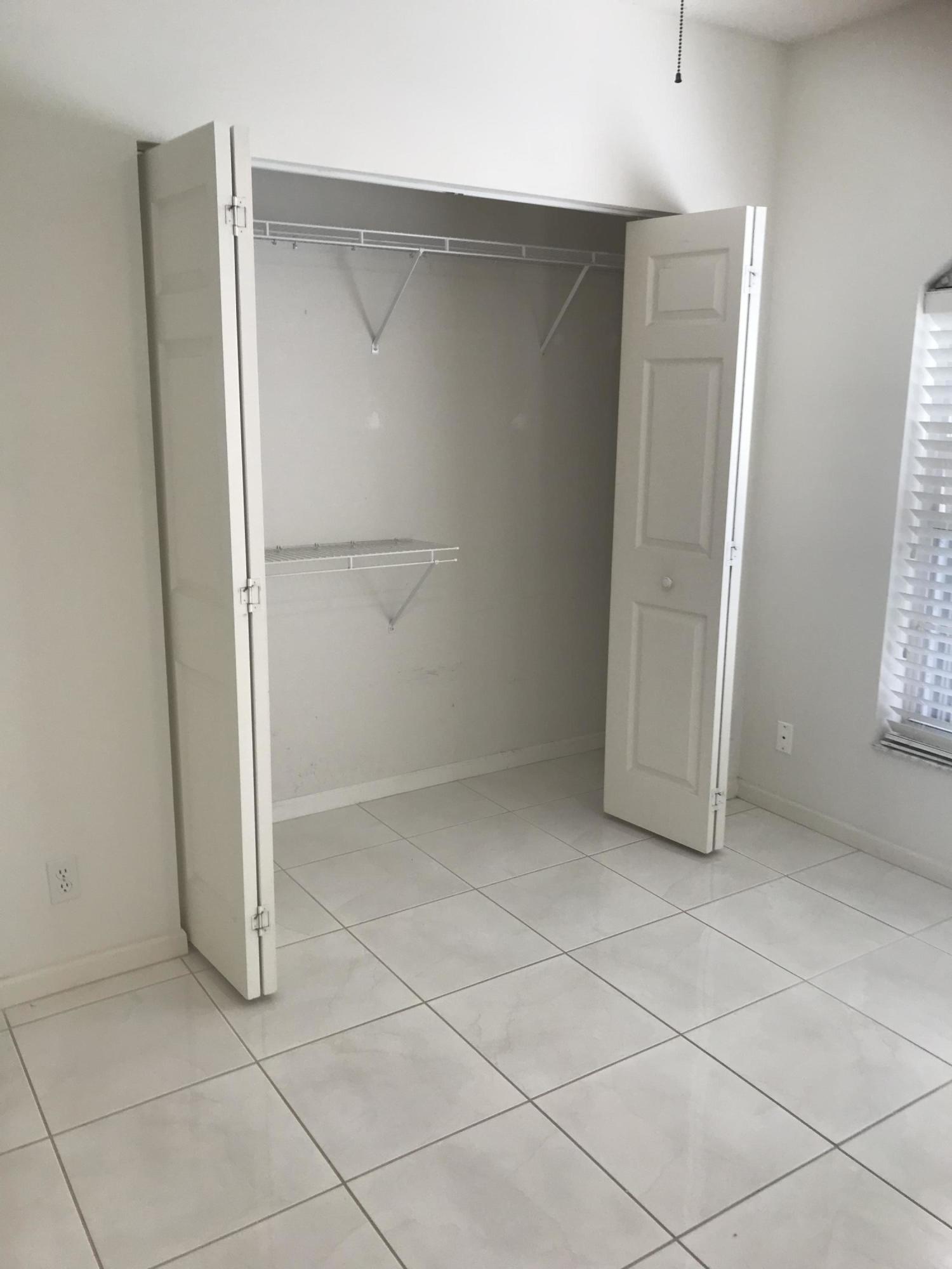 6340 Long Key Lane Boynton Beach, FL 33472 - Photo 18 of 31 closet in 2nd bedroom