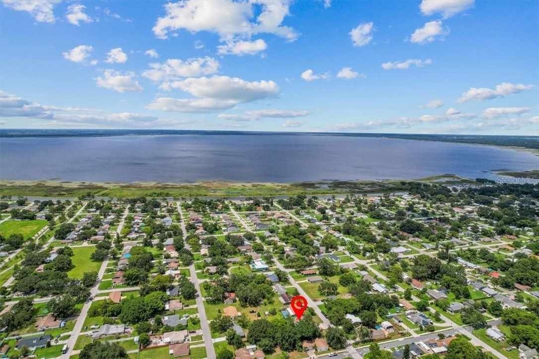 424 Wisconsin Avenue St. Cloud, FL 34769 - Photo 3 of 36 a view of a bunch of plants and trees