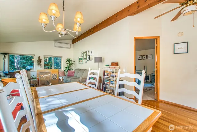 a view of a hallway with couches and furniture