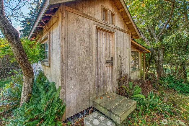 a view of trees and a balcony