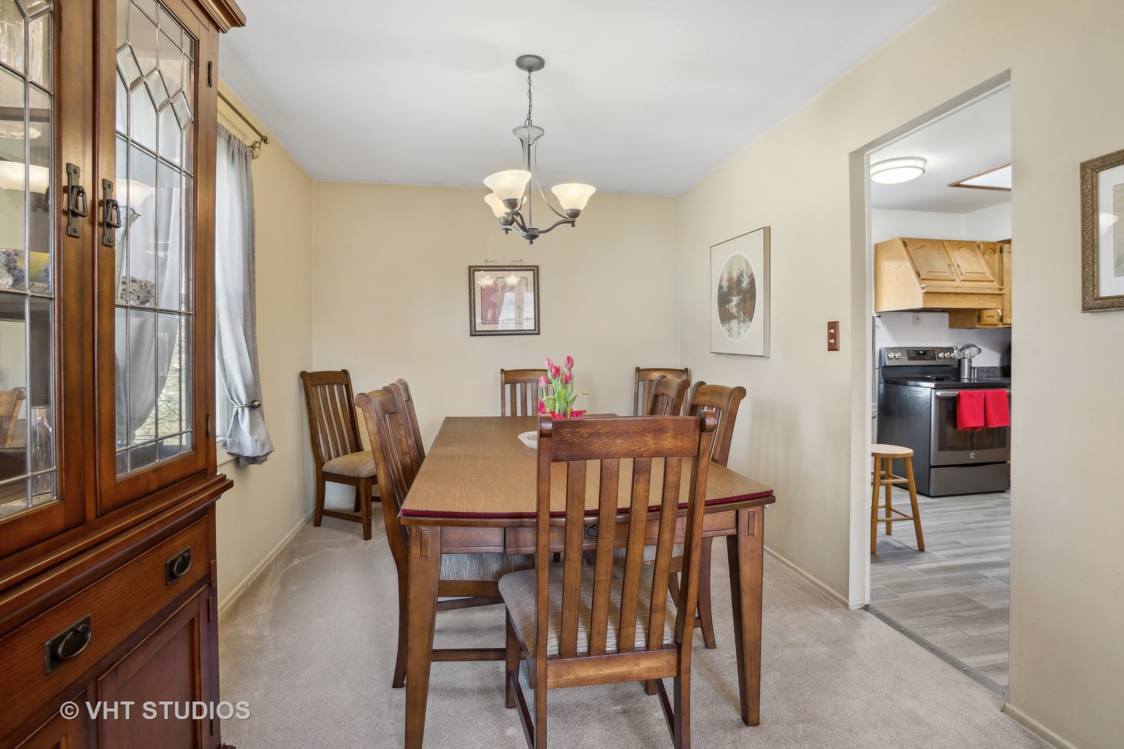 1470 Nottingham Lane Hoffman Estates, IL 60169 - Photo 7 of 16 a view of a dining room with furniture window and outside view