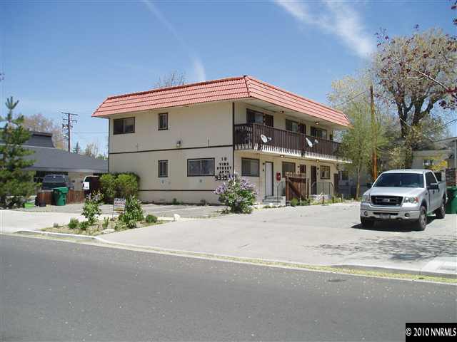 18 Vine Street Reno, NV 89503 - Photo 1 of 6 a car parked in front of white house