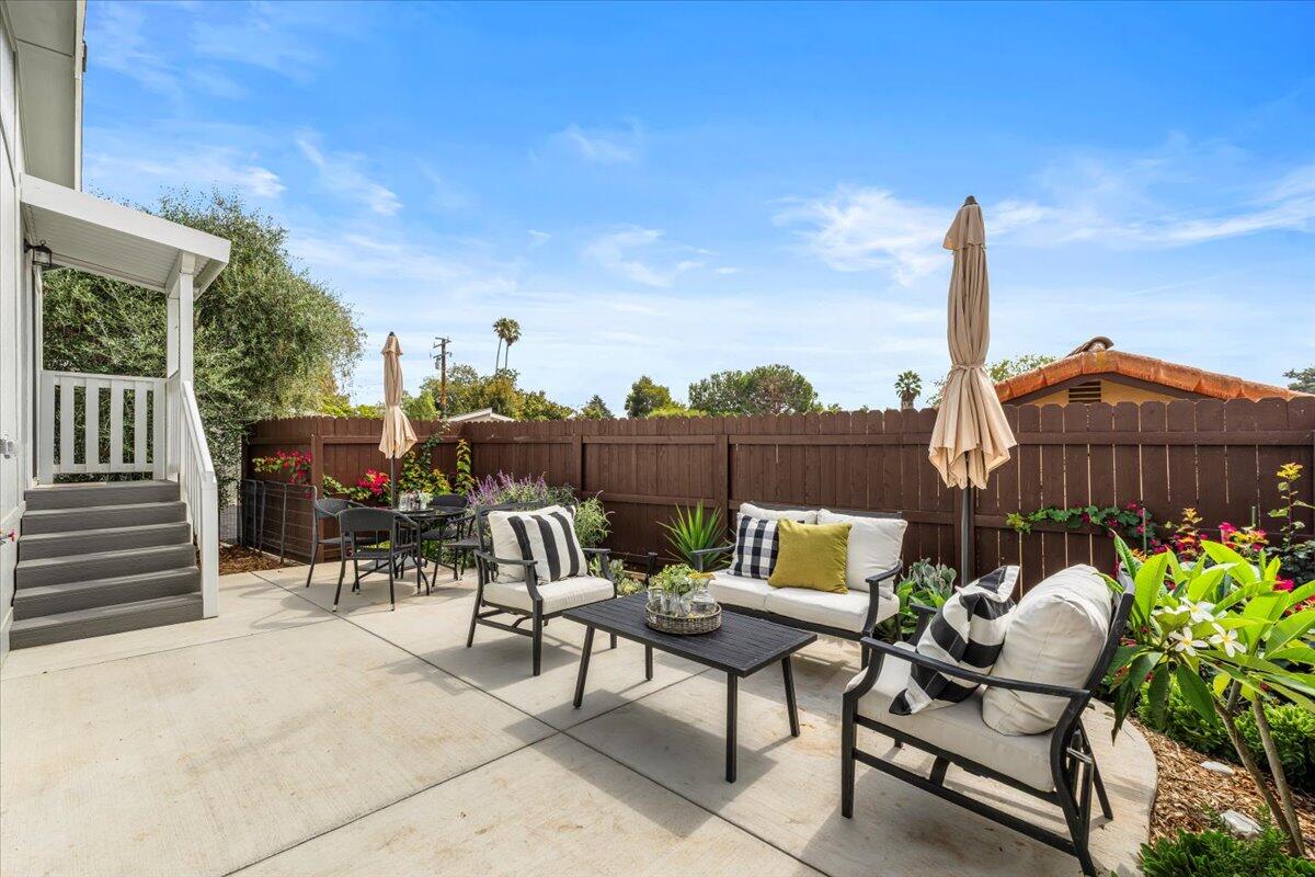 333 Old Mill Road, Unit SPC 157 Santa Barbara, CA 93110 - Photo 14 of 23 a patio with glass top table and chairs