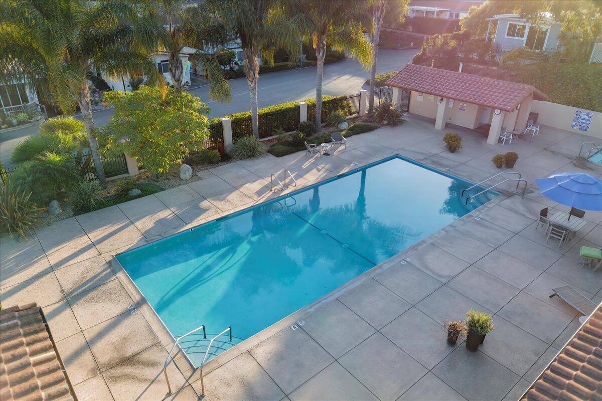 333 Old Mill Road, Unit SPC 157 Santa Barbara, CA 93110 - Photo 18 of 23 a view of a pool with two chairs