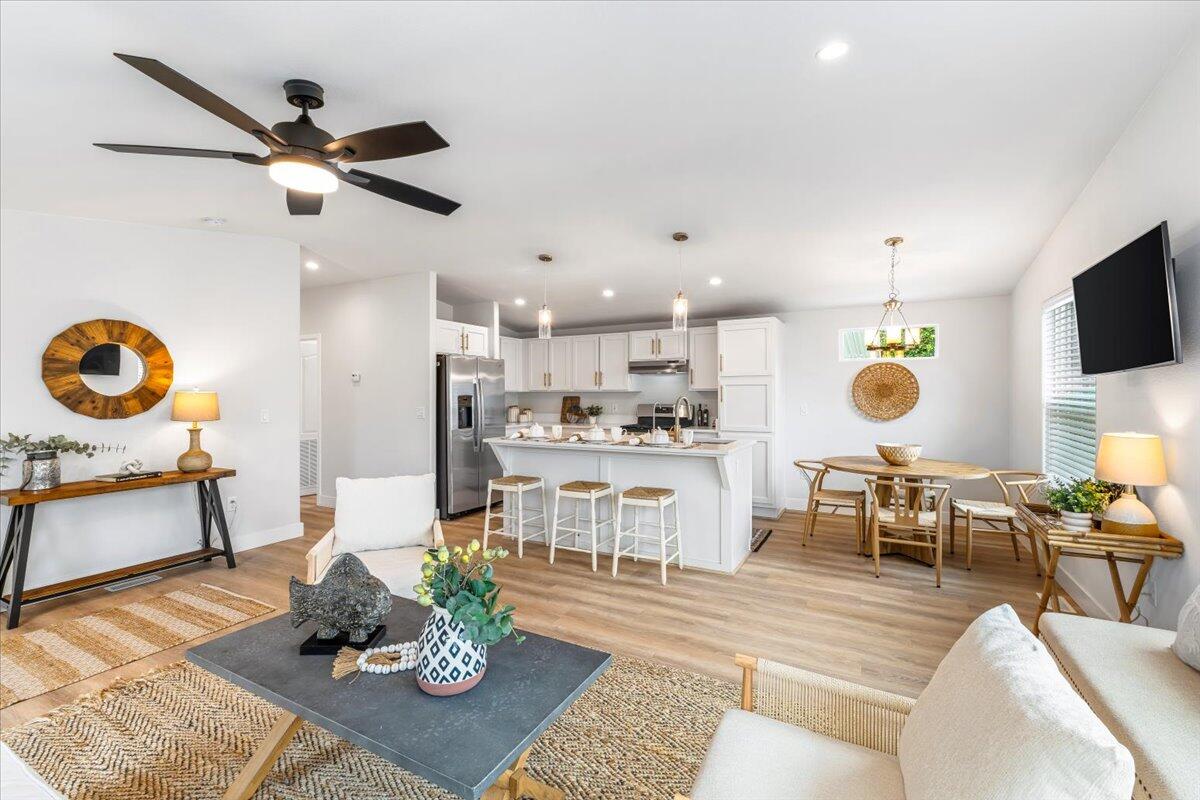 333 Old Mill Road, Unit SPC 157 Santa Barbara, CA 93110 - Photo 2 of 23 a living room with furniture and kitchen view