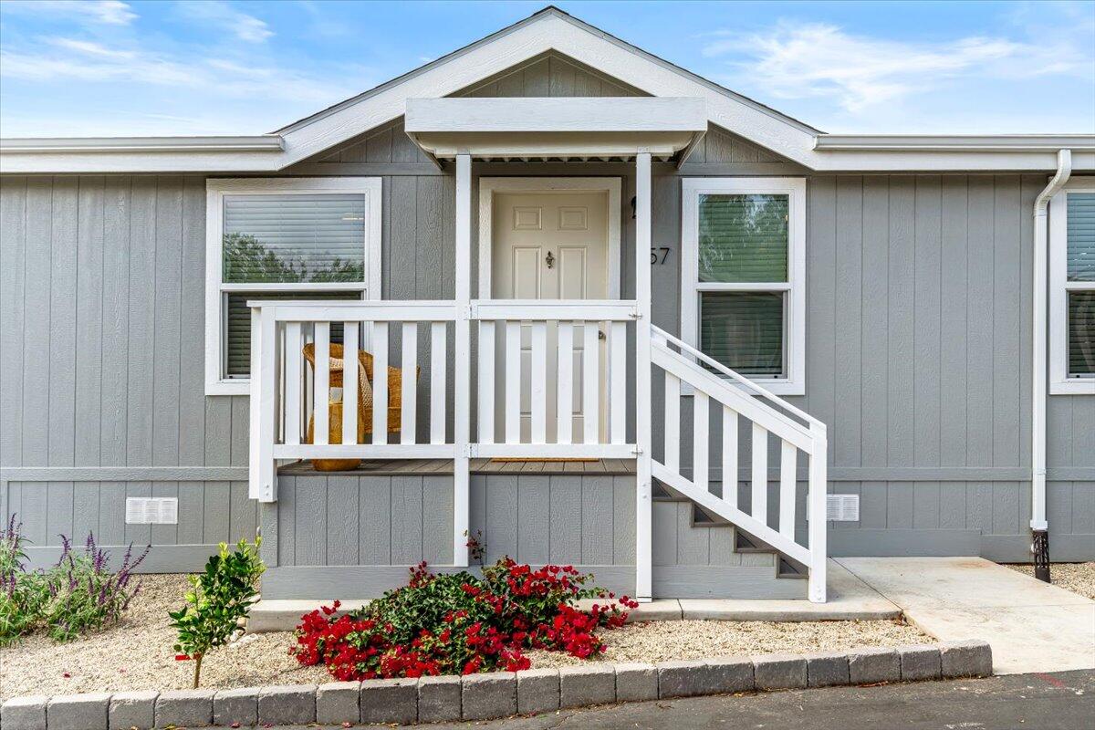 333 Old Mill Road, Unit SPC 157 Santa Barbara, CA 93110 - Photo 21 of 23 a front view of a house with a porch