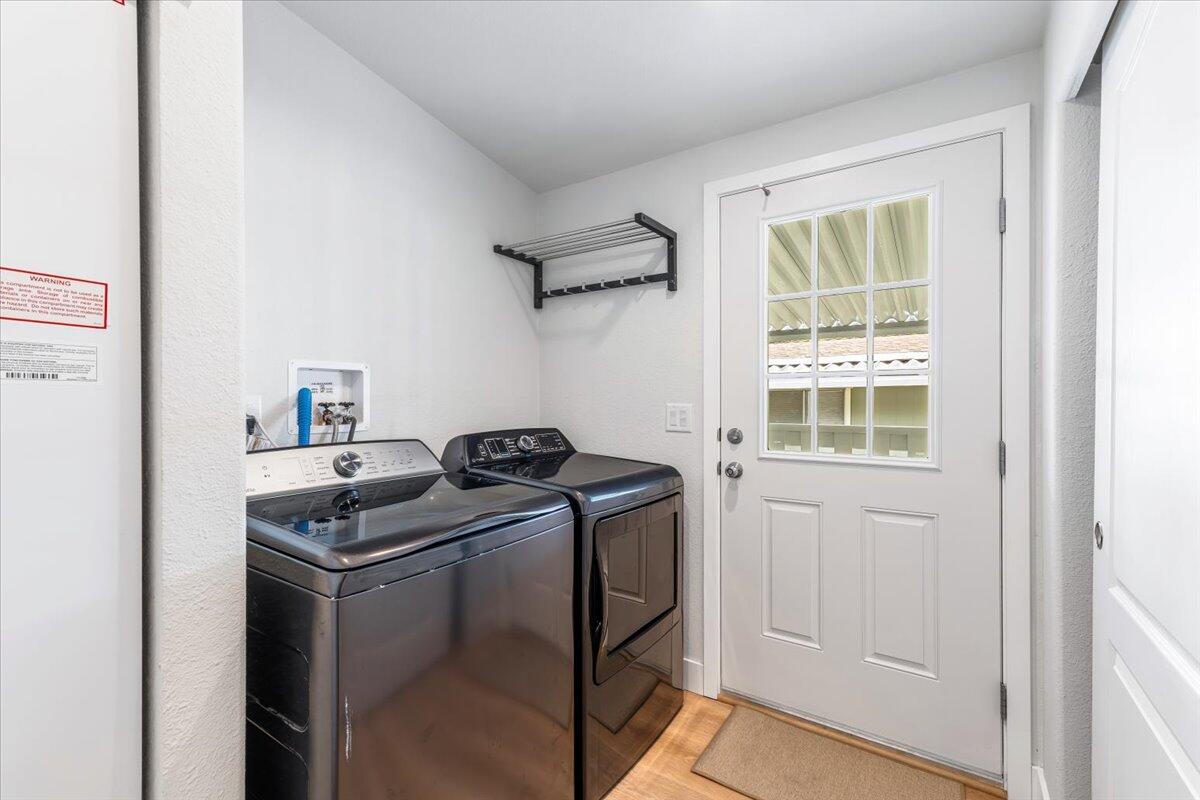 333 Old Mill Road, Unit SPC 157 Santa Barbara, CA 93110 - Photo 5 of 23 a utility room with sink dryer and washer