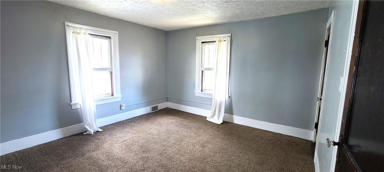 3210 Dryden Court Southwest Canton, OH 44708 - Photo 17 of 24 Carpeted bedroom featuring plenty of natural light