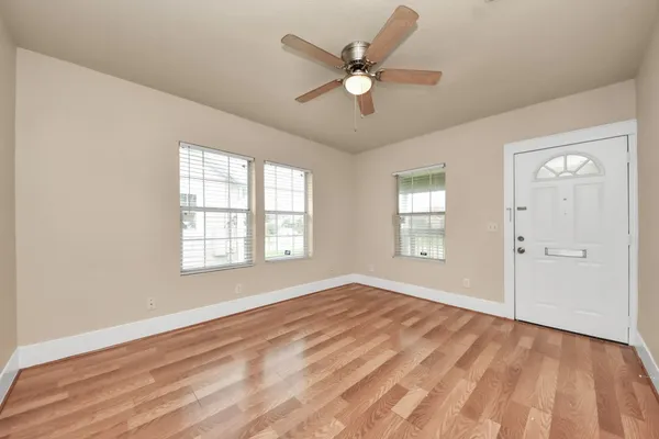 a view of an empty room with a window