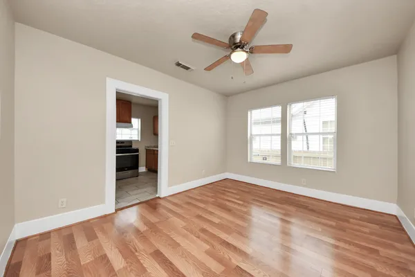 a view of an empty room with a window