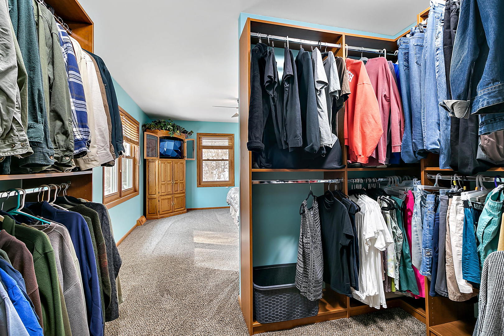 3320 North Jugtown Road Morris, IL 60450 - Photo 14 of 48 a view of walk in closet with clothes and shoes