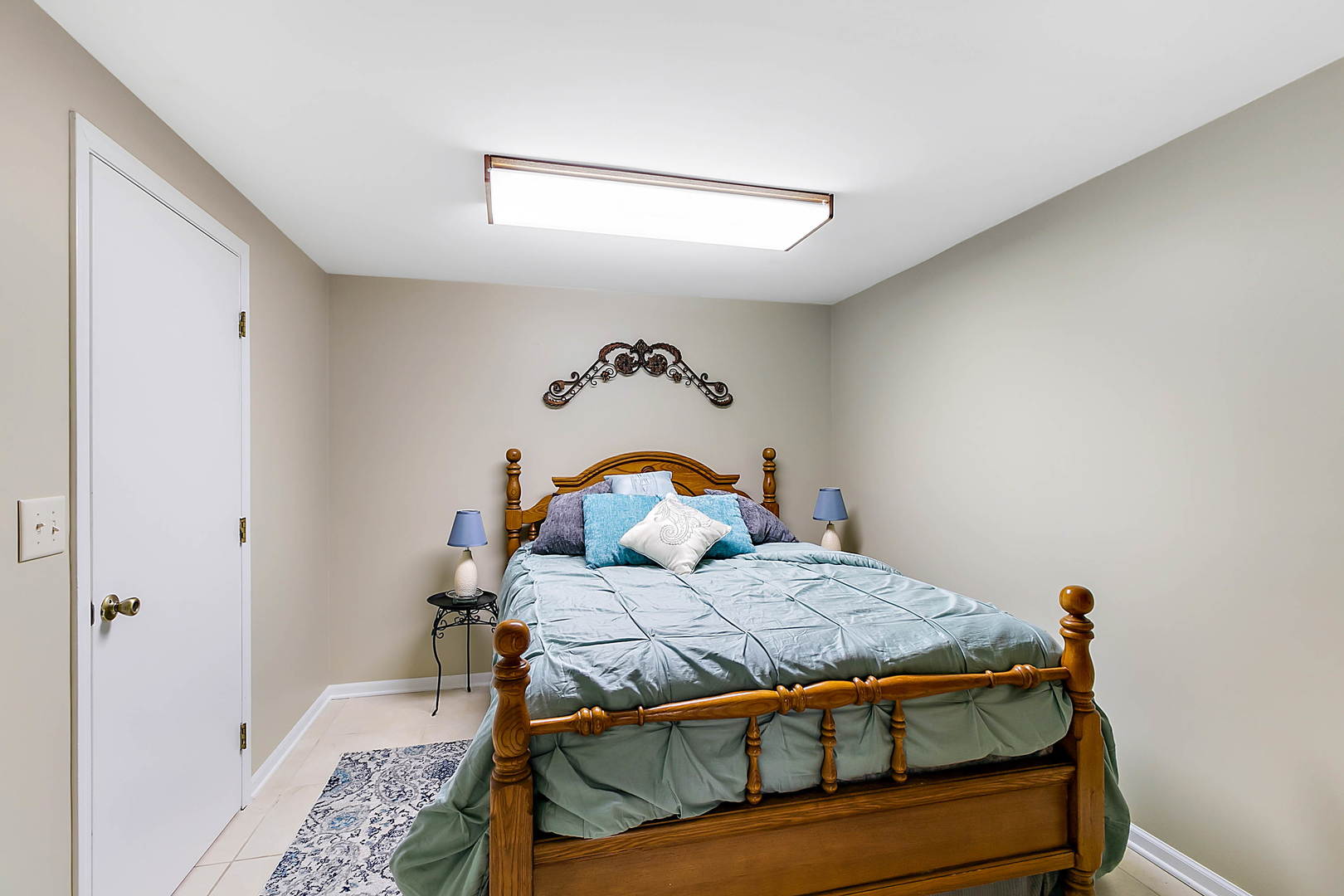 3320 North Jugtown Road Morris, IL 60450 - Photo 24 of 48 a bedroom with a bed and a chandelier